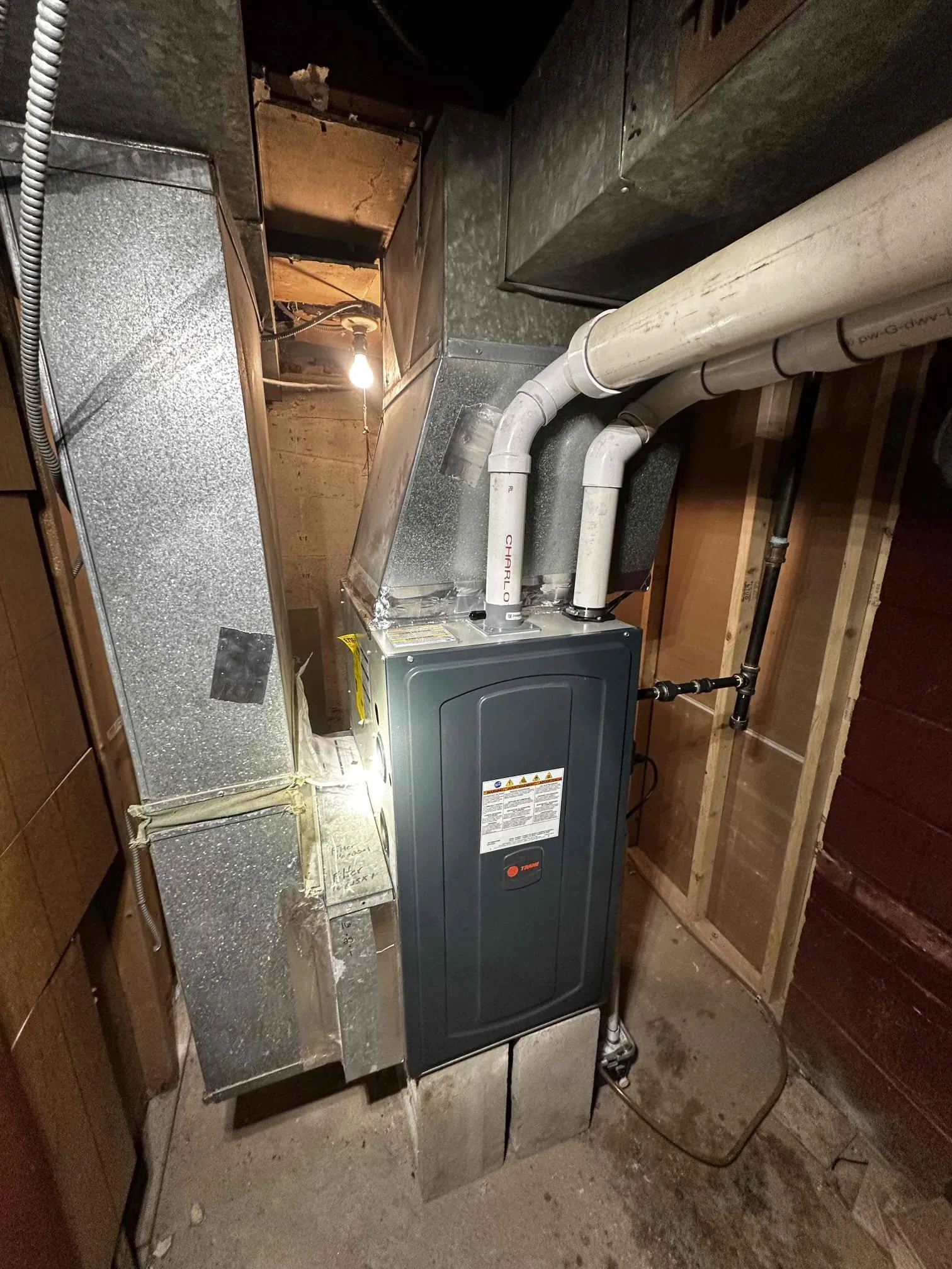 Trane gas furnace with PVC venting installed in a Bridgeport North End basement by Celco
