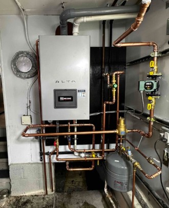 Burnham Alta combination boiler with copper piping and Taco circulator installed in a Noroton Heights home by Celco