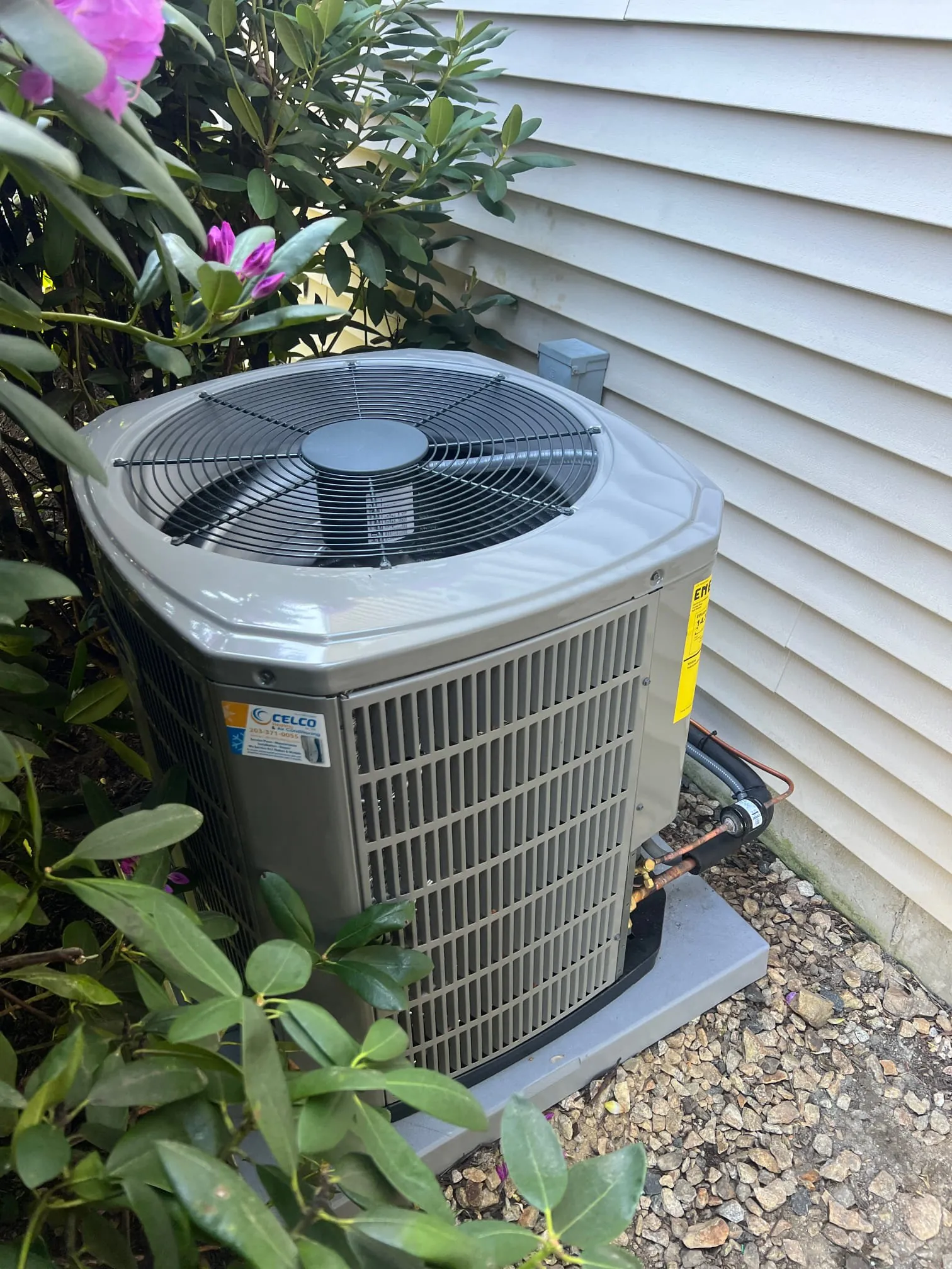 Trane outdoor condenser with Celco sticker installed at a Trumbull Center home