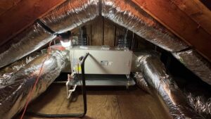 Bosch heat pump air handler and new insulated ductwork installed by Celco in a Fairfield, CT attic