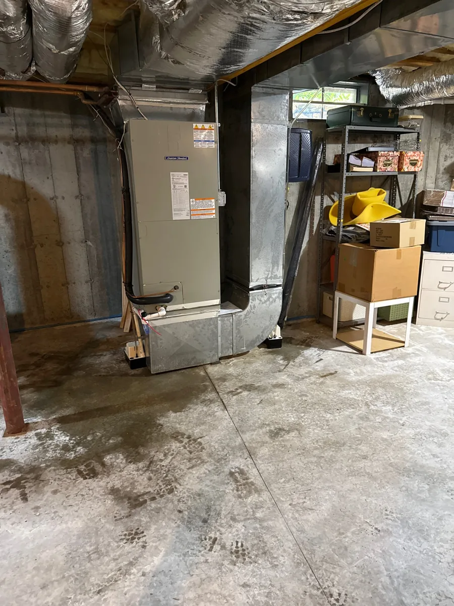 New American Standard air handler connected to ductwork in an Easton, CT basement, installed by Celco