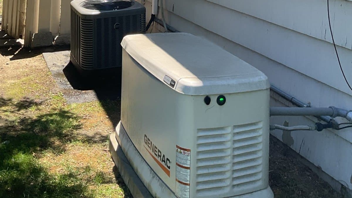 Generac automatic standby generator installed beside a home in Westport, CT