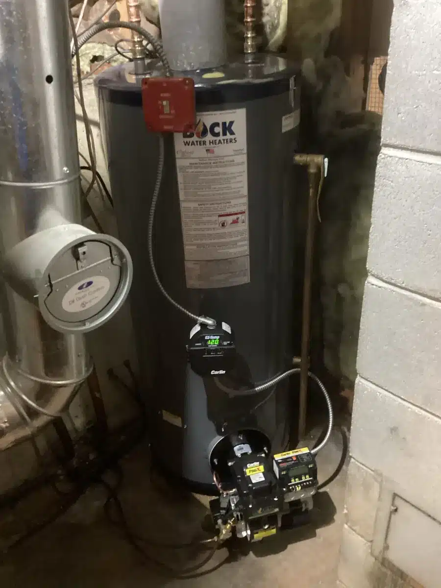 Bock oil-fired water heater with a new burner installed in a Shelton, CT basement by Celco